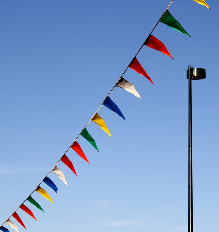 pennant streamer flags to a light pole